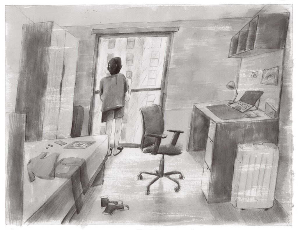 Standing by the window of my room, looking out.